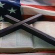 US flag and bible cross